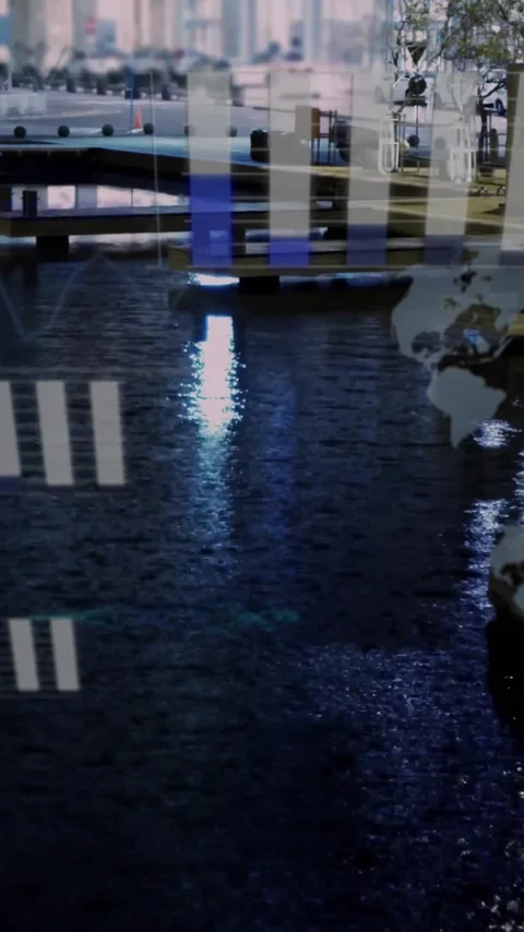 Graphs and world map animation over urban waterfront at night Stock Footage 344370292