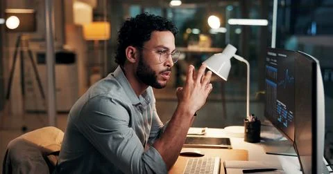 Graphs, man and thinking with computer screen at night for market timing, t.. Stock Photos