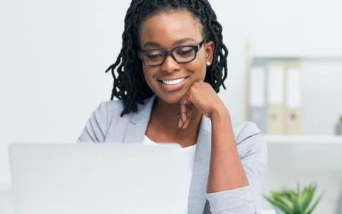 Grapic Designer Watching Tutorial About Creative Ideas On Laptop Fotos de archivo