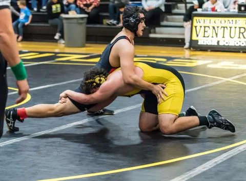 Grapplers battling under the spotlight Stock Photos