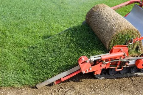 Grass baling machine Stock Photos