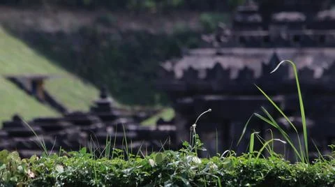 Grass with Blurred Ancient Temple Background Stock Photos