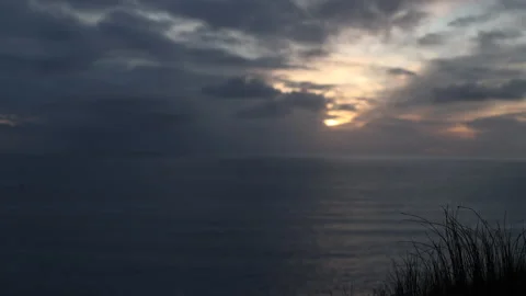 Grass on a Cliff's Edge Overlooking the Ocean At Sunset. Achill Island, Ireland. Stock-Footage 239548504