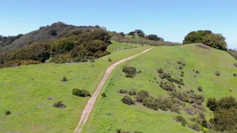 Grass Covered Ridge Lines and Hills Stock Footage 275261809