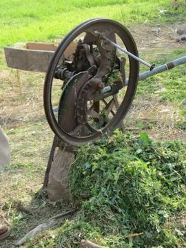 Grass cutting machine in rurals areas. A main source for cutting grass. Stock Photos