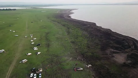 Grass field at the end of Pa Sak Jolasid Dam In the summer, Stock-Footage 242701028