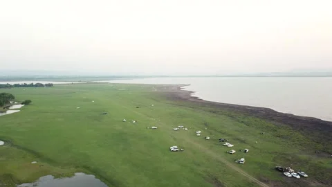 Grass field at the end of Pa Sak Jolasid Dam In the summer Stock-Footage 242701792