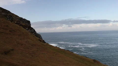 Grass Foreground on a Cliff's Edge. Stock Footage 239486778