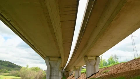 Grass growing under highway bridge Stock Footage 154641795