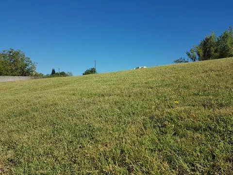 Grass lawn sky clouds for background Stock Photos