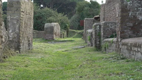 Grass Path Between Brick Building Remains at Historic Roman Site Stock Footage 345968837