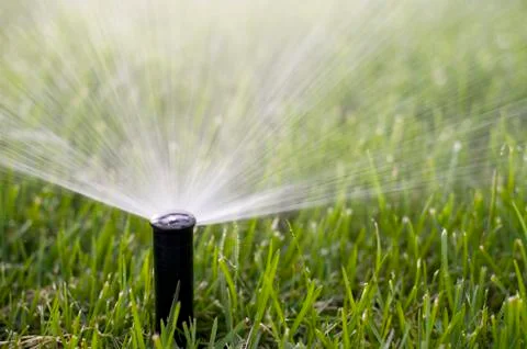 Grass Sprinkler Stock Photos