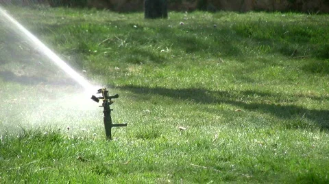 Grass sprinkler slow motion Stock Footage 363321