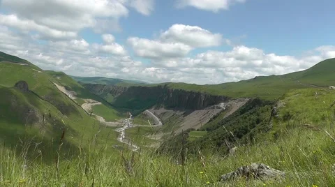 Grass in the wind mountain landscape Stock Footage 62296033