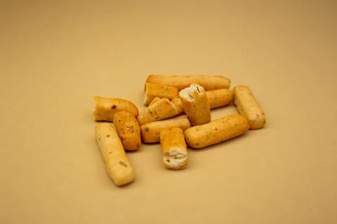 Grassini slide on a beige background Stock Photos