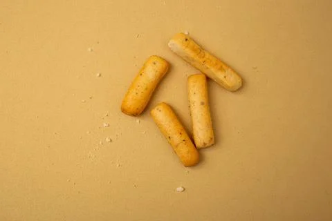 Grassini slide on a beige background Stock Photos