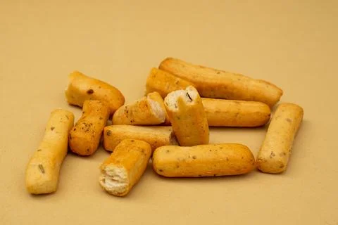 Grassini slide on a beige background Stock Photos