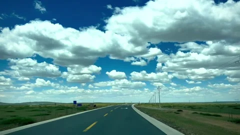 Grassland Highway - Floating Clouds Stock Footage 333323644