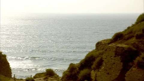 Grassy cliffs with Mediterranean sea Video stock 95600701