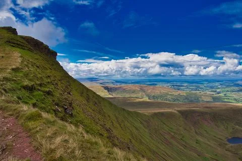 With grassy patch of land: Pen y Fan, Brecon Beacons National Park, Wales Foto stock