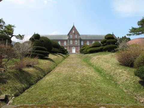 Grassy path to mansion Foto stock