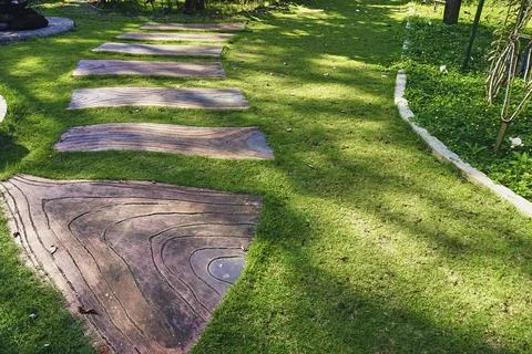 Grassy path in the park area Stock Photos