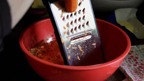 Grate the carrots Stock Footage 76720019