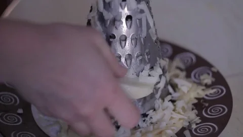 Grate the potatoes on a grater Stock Footage 71252191