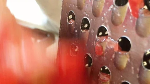 To grate the tomatoes Stock Footage 98839132