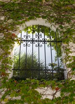 Grate in the window Stock Photos