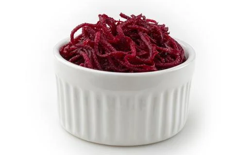 Grated beets isolated on white background. Stock Photos