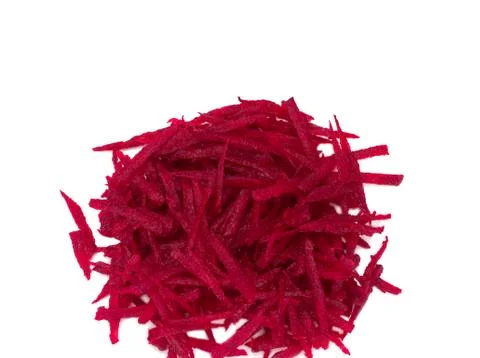 Grated beets on white background Stock Photos
