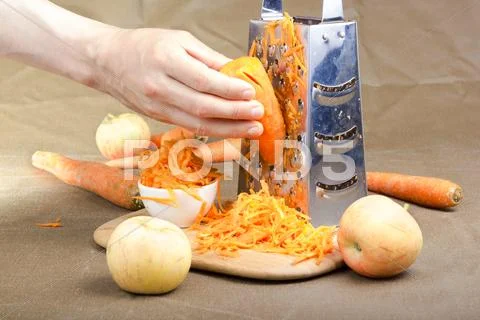 Grated carrot. Stock Photos