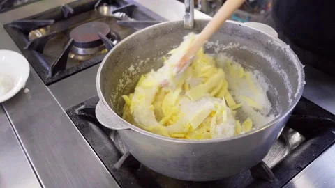 Grated cheese and corn flour for cooking hominy Stock Footage 286311330