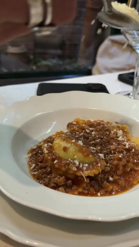Grated Cheese Being Sprinkled Over Ravioli Dish Stock Footage 342815028