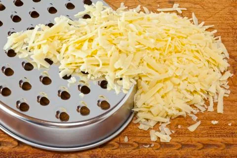 Grated cheese Stock Photos