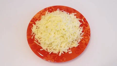 Grated cheese on a plate close up. Stock Footage 137203895