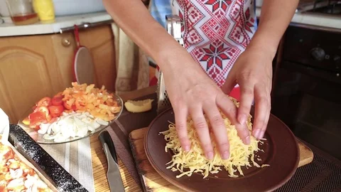 Grated cheese in a plate Stock Footage 77571868