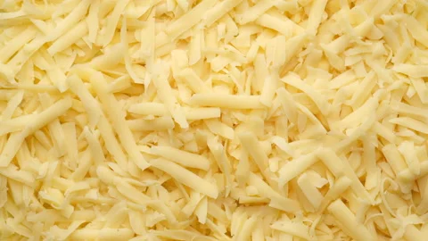 Grated cheese rotating top view Stock Footage 135782273