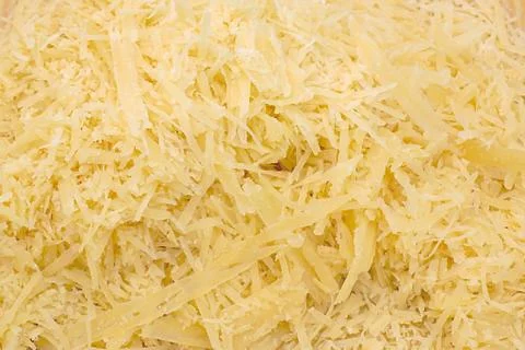 Grated cheese texture background Stock Photos