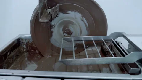 Grated cocoa is subjected to long-term continuous intensive stirring  Stock Footage 167567262