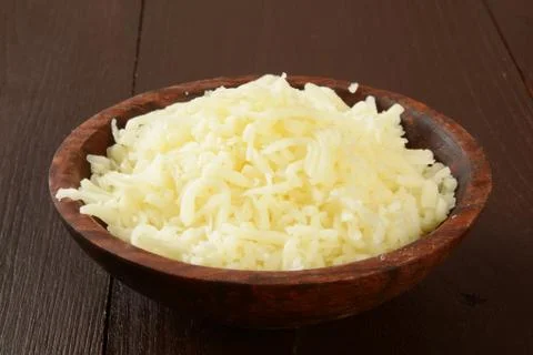 Grated mozzarella cheese Stock Photos