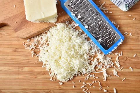 Grated mozzarella cheese Stock Photos