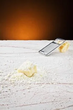 Grated parmesan cheese Stock Photos