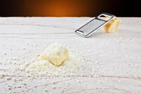 Grated parmesan cheese Stock Photos