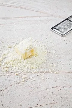Grated parmesan cheese Stock Photos