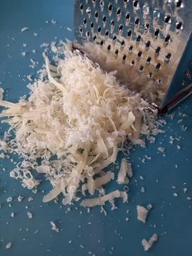 Grated parmesan cheese Stock Photos