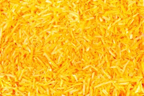 Grated pumpkin as texture Stock Photos