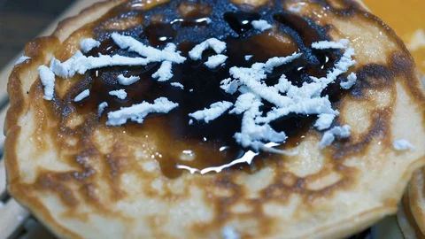 Grated white cheese on a pan with a jam Stock-Footage 88042399