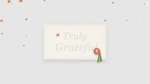 Grateful text overlay with decorative elements on a gray background Stock Footage 344559581